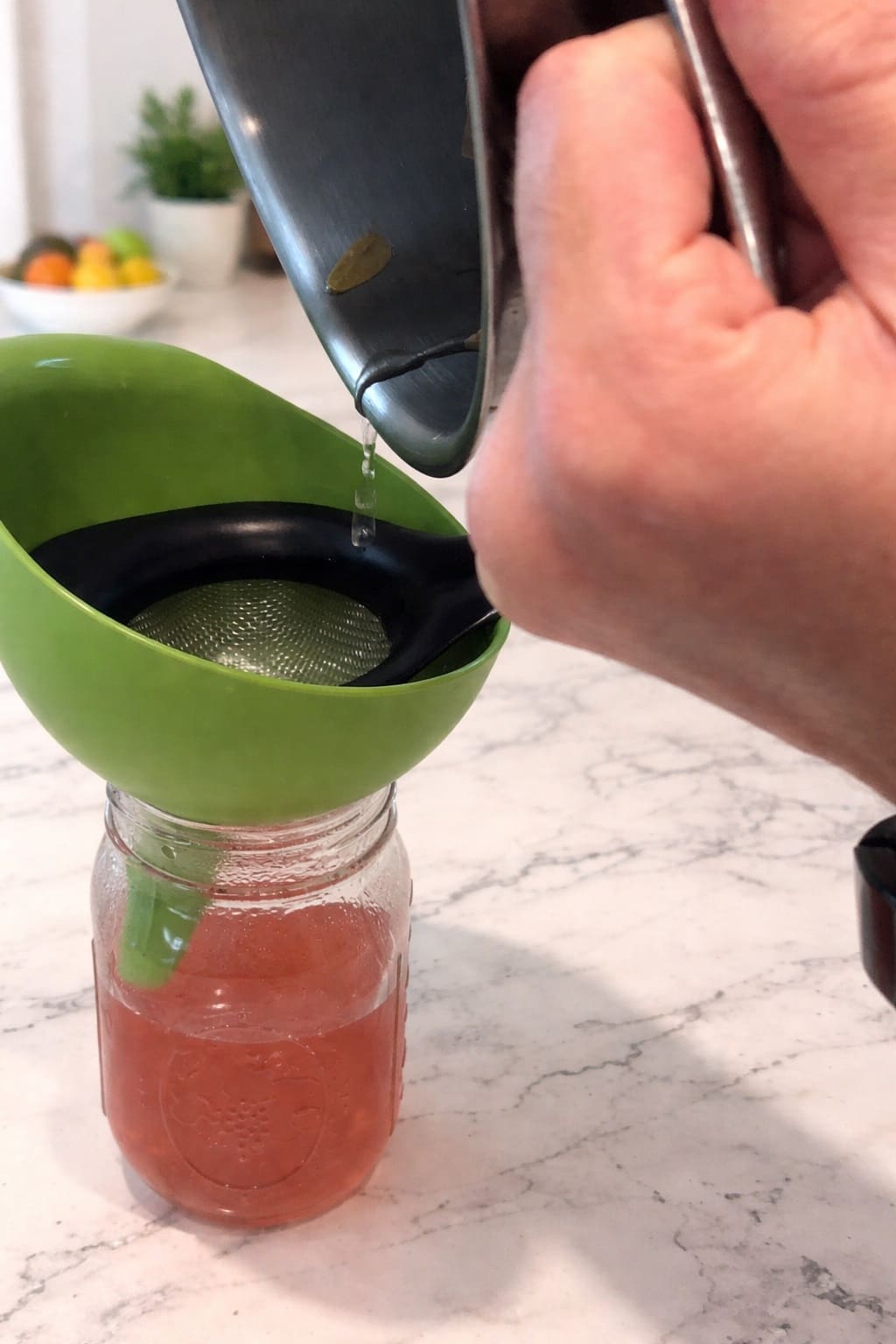 Strain and cool rose water